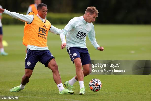 Marc Albrighton of Leicester City under pressure from Youri Tielemans of Leicester City during the Leicester City training session at Leicester City...