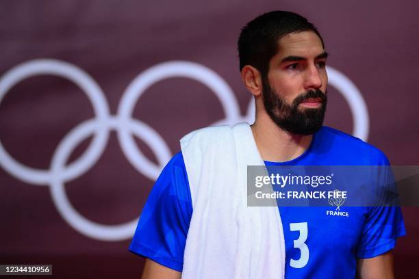 France's centre back Nikola Karabatic arrives for the second half during the men's quarterfinal handball match between France and Bahrain of the...