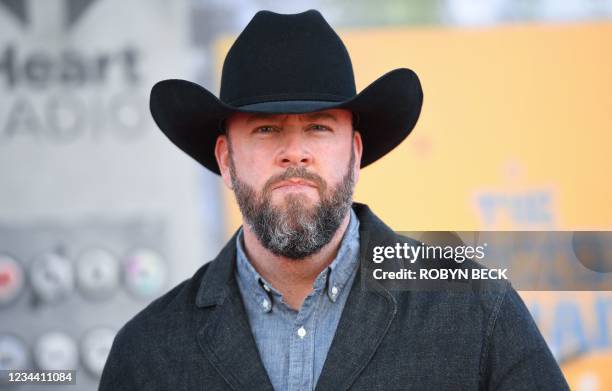 Actor Chris Sullivan arrives for the premiere of "The Suicide Squad" at the Regency Village theatre in Westwood, California on August 2, 2021.