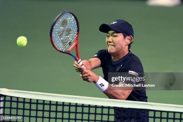 Yoshihito Nishioka of Japan returns a shot against Jack Sock of the United States on Day 3 of the Citi Open at Rock Creek Tennis Center on August 2,...