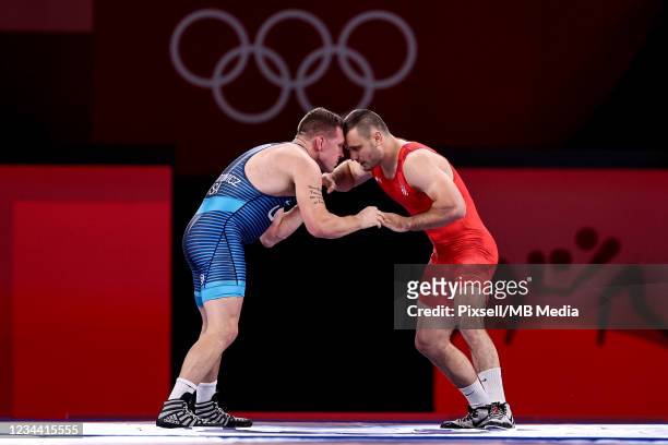 Ivan Huklek of Team Croatia competes against John Walter Stefanowicz jr of Team United States during the Men's Greco-Roman 87kg 1/8 Final on day...