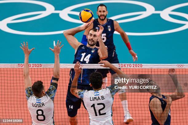 Italy's Gianluca Galassi spikes the ball in the men's quarter-final volleyball match between Italy and Argentina during the Tokyo 2020 Olympic Games...