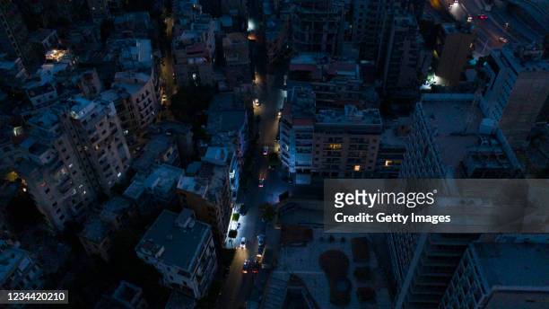 An aerial view at dusk of the Mar Mikhael neighborhood near the port during a power outage on August 2, 2021 in Beirut, Lebanon. Electricite du Liban...