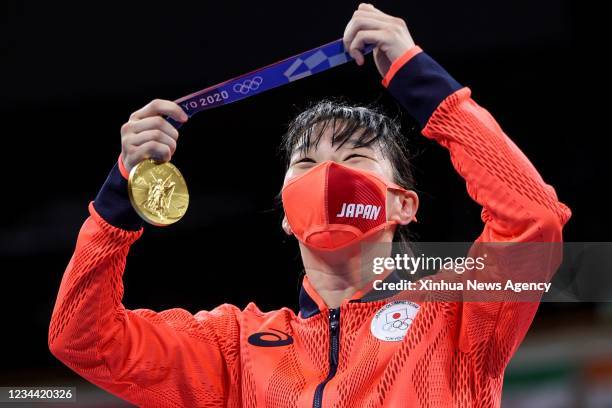 Gold medalist Irie Sena of Japan poses for photo at the awarding ceremony of the women's feather 54-57kg of boxing at the Tokyo 2020 Olympic Games in...