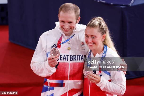 Silver medallist Great Britain's men's track cycling team sprint Jason Kenny poses with his wife silver medallist Great Britain's women's track...