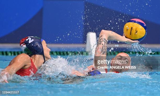 Hungary's Dorottya Szilagyi vies with Netherlands' Sabrina Van Der Sloot during the Tokyo 2020 Olympic Games women's water polo quarter-final match...