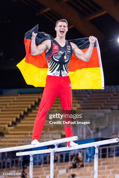 Lukas Daueser of Germany celebrates in the Men's Parallel Bars Final Artistic Gymnastics Competition on day eleven of the Tokyo 2020 Olympic Games at...