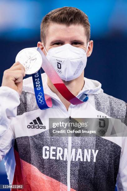 Lukas Dauser of Germany celebrates in the Men's Parallel Bars Final Artistic Gymnastics Competition on day eleven of the Tokyo 2020 Olympic Games at...
