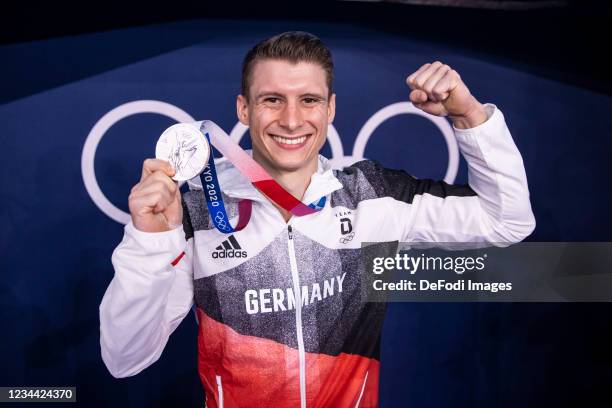 Lukas Dauser of Germany celebrates in the Men's Parallel Bars Final Artistic Gymnastics Competition on day eleven of the Tokyo 2020 Olympic Games at...