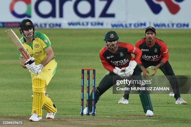 Australia's Mitchell Marsh plays a shot during first Twenty20 international cricket match between Bangladesh and Australia at the Sher-e-Bangla...