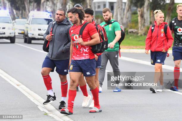 Kyle Winckler and Josh Navidi of the touring British & Irish Lions rugby side arrive for a team practice session at Hermanus High School on August...
