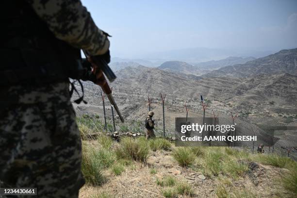 Pakistani troops patrol along Pakistan-Afghanistan border at Big Ben post in Khyber district in Khyber Pakhtunkhwa province August 3, 2021.