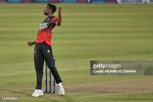Bangladesh's Shoriful Islam celebrates after the dismissal of Australia's Andrew Tye during first Twenty20 international cricket match between...