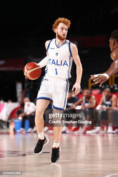 Nico Mannion of the Italy Men's National Team dribbles the ball during the game against the France Men's National Team during the 2020 Tokyo Olympics...
