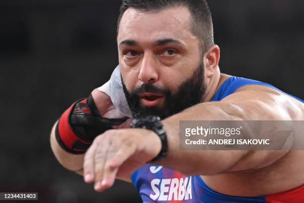 Serbia's Asmir Kolasinac competes in the men's shot put qualification during the Tokyo 2020 Olympic Games at the Olympic Stadium in Tokyo on August...