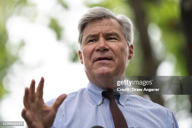 Sen. Sheldon Whitehouse speaks during a rally about voting rights and ending the filibuster near the U.S. Capitol on August 3, 2021 in Washington,...