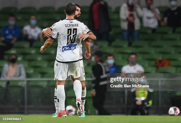 Dublin , Ireland - 3 August 2021; Nélson Oliveira of PAOK celebrates after scoring his side's first goal with team-matew Stefan Schwab during the...