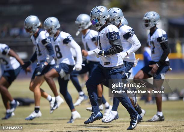 Running back Ezekiel Elliott of the Dallas Cowboys warms up for practice at River Ridge Complex on August 3, 2021 in Oxnard, California.