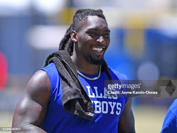 Defensive end DeMarcus Lawrence of the Dallas Cowboys is interviewed by media during training camp at River Ridge Complex on August 3, 2021 in...