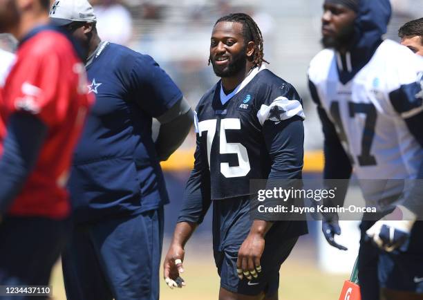 Defensive tackle Osa Odighizuwa of the Dallas Cowboys participates in drills during training camp at River Ridge Complex on August 3, 2021 in Oxnard,...