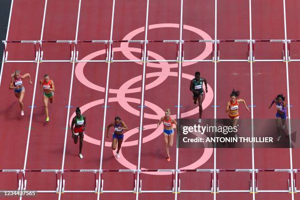 S Kendell Williams competes to win the women's heptathlon 100m hurdles during the Tokyo 2020 Olympic Games at the Olympic Stadium in Tokyo on August...