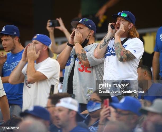 Fans boo the Houston Astros in the first inning of the game against the Los Angeles Dodgers at Dodger Stadium on August 3, 2021 in Los Angeles,...