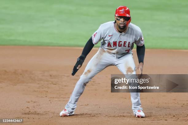 Los Angeles Angels center fielder Jo Adell watches for a pitch at first base during the game between the Texas Rangers and the Los Angeles Angels on...