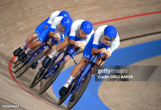 Italy's Jonathan Milan, Italy's Filippo Ganna, Italy's Francesco Lamon and Italy's Simone Consonni compete in the men's track cycling team pursuit...