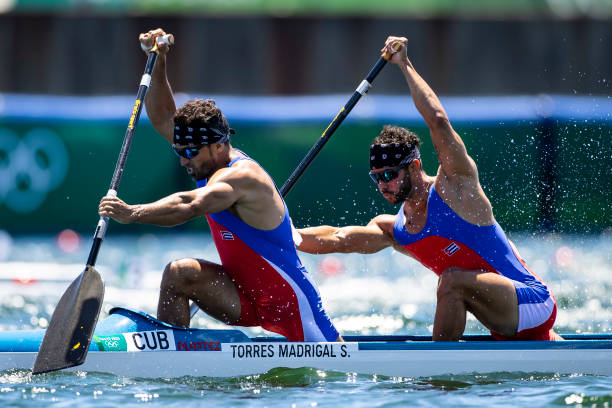 Serguey Torres Madrigal of Cuba and Fernando Dayan Jorge Enriquez of Cuba ,compete,at Men's Canoe Double 1000m Final A in the Canoe Sprints on day...