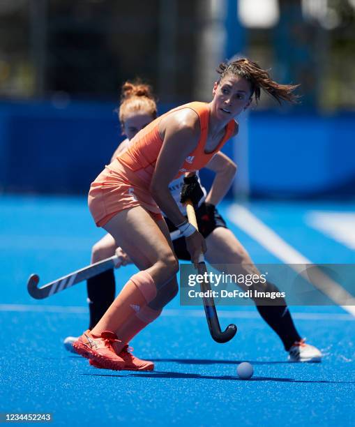 Malou Pheninckx of Netherlands battle for the ball in the Women's Semifinal Hockey match between Netherlands and Great Britain on day twelve of the...