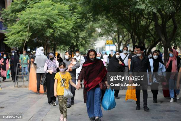 People wear face masks as a measure against coronavirus pandemic in their daily lives Grand Bazaar in Tehran, Iran on August 04, 2021. Coronavirus...