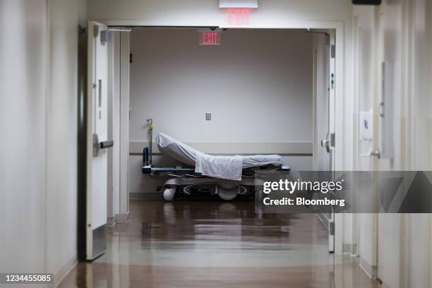 Hospital gurney in a hallway at Freeman Hospital West in Joplin, Missouri, U.S., on Tuesday, Aug. 3, 2021. Hospitals in states where Covid-19 cases...