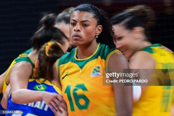 Brazil's Fernanda Rodrigues reacts after a point in the women's quarter-final volleyball match between Brazil and Russia during the Tokyo 2020...