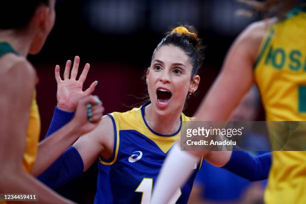 Players of Brazil react after a point during the women's quarter-final volleyball match between Brazil and Russia during the Tokyo 2020 Olympic Games...