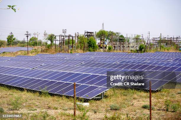 solar panels farm or solar cell with sunlight, india. - renewable energy india stock pictures, royalty-free photos & images