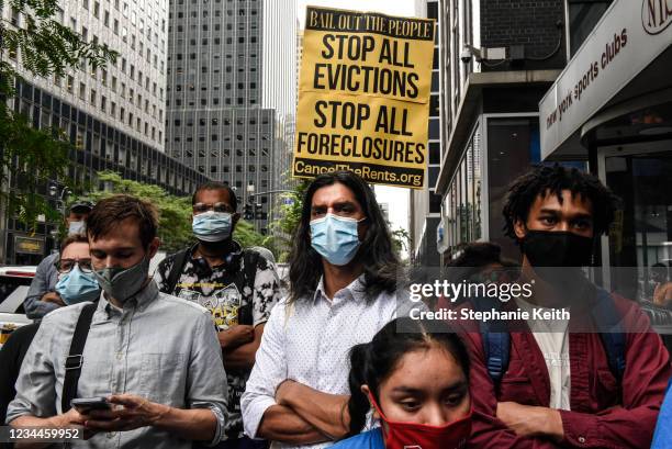 People participate in a protest against N.Y. Governor Andrew Cuomo and protest for a moratorium on evictions on August 4, 2021 in New York City. The...