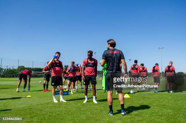 Russell Martin, Head Coach of Swansea City speaks with the players during the Swansea City Training at The Fairwood Training Ground on August 04,...