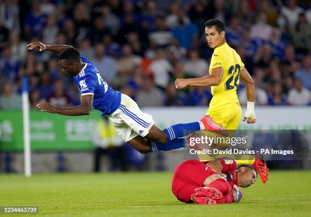 Leicester City's Patson Daka trips over Villareal goalkeeper Sergio Asenjo during the Pre-Season Friendly match at The King Power Stadium, Leicester....