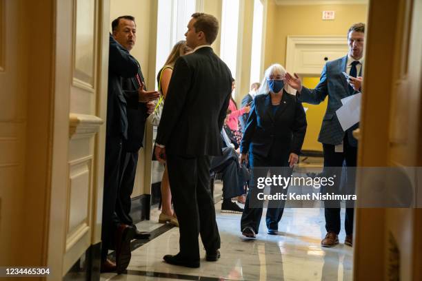 Sen. Patty Murray navigates a hallway crowded with Senate Republican staffers outside a Republican lunch on Capitol Hill on Wednesday, Aug. 4, 2021...