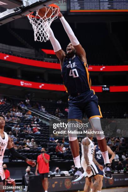 Justin Patton of the Utah Jazz Blue dunks the ball against the San Antonio Spurs during the 2021 Salt Lake City Summer League on August 4, 2021 at...