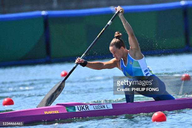 Ukraine's Luidmyla Luzan competes in a semi-final of the women's canoe single 200m event during the Tokyo 2020 Olympic Games at Sea Forest Waterway...