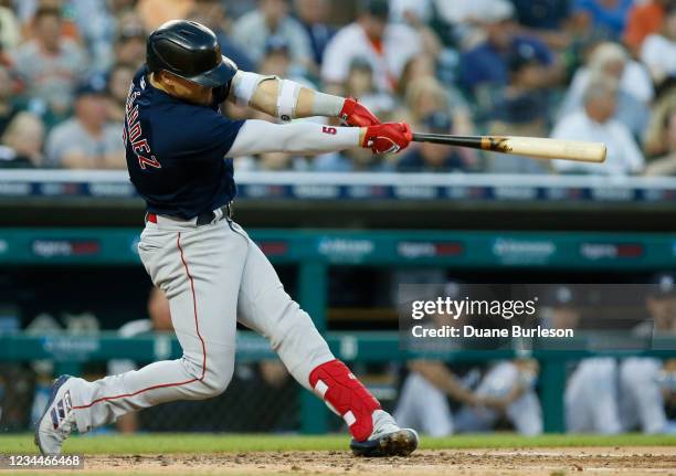 Enrique Hernandez of the Boston Red Sox hits a two-run home run against the Detroit Tigers during the fifth inning at Comerica Park on August 4 in...