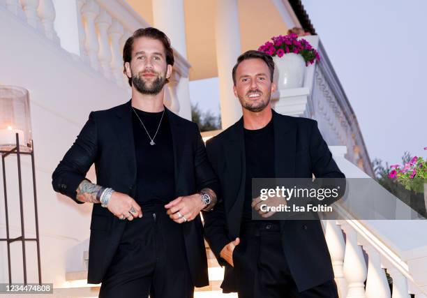 Influencer Andre Hamann and influencer Dennis Mitch attend the Villa Remus Opening on August 4, 2021 in Palma de Mallorca, Spain.