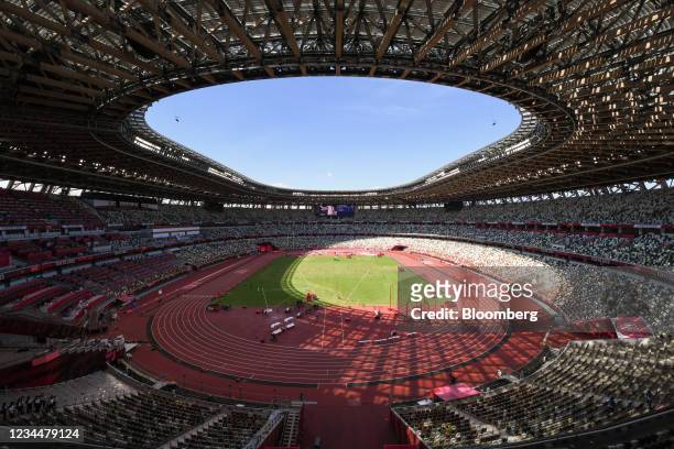 The running track and field at the National Stadium, the main venue for the Tokyo 2020 Olympic and Paralympic Games, in Tokyo, Japan, on Thursday,...