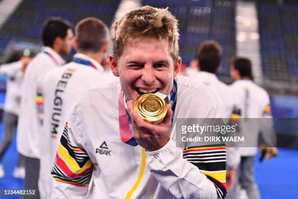 Belgium's Victor Wegnez celebrates after winning shoot-outs after the 1-1 end score in the final hockey match between Belgium's Red Lions and...