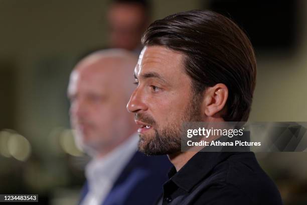 Club CEO Julian Winter with newly appointed Swansea Manager Russell Martin speak to reporters during the Swansea City Press Conference at the Liberty...