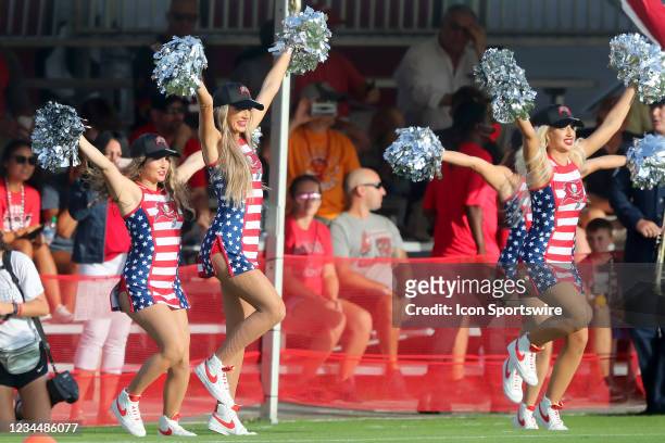 The Buccaneers cheerleaders entertain the fans on Military day during the Tampa Bay Buccaneers Training Camp on August 05, 2021 at the AdventHealth...