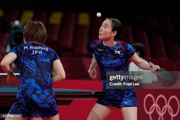 Hirano Miu and Ishikawa Kasumi in action during their Women's Team Gold Medal table tennis match on day thirteen of the Tokyo 2020 Olympic Games at...