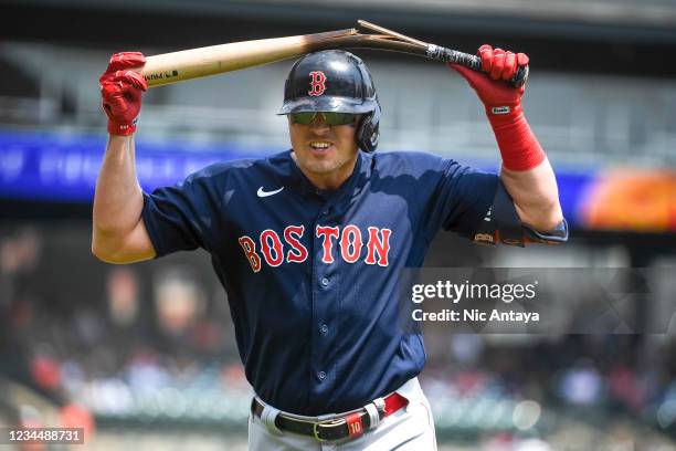 Hunter Renfroe of the Boston Red Sox breaks a baseball hat over his head against the Detroit Tigers during the top of the fourth inning at Comerica...