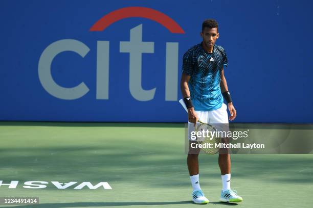 Felix Auger-Aliasime of Canada looks on during a match against Jenson Brooksby of the United States on Day 6 during the Citi Open at Rock Creek...